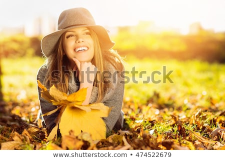 Stockfoto: Woman In The Autumn Park