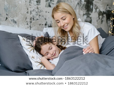 Stock photo: Portrait Of Loving Mother And Daughter Stroking Her Face