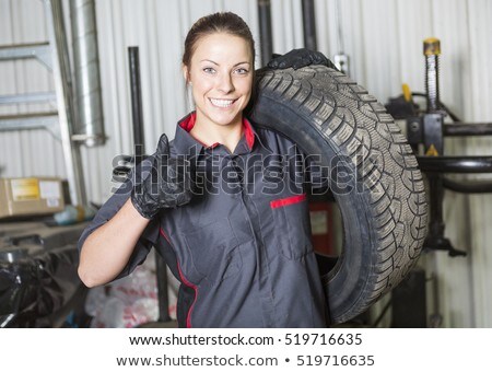 Mechanic Woman Working On Car In His Shop Foto d'archivio © Lopolo