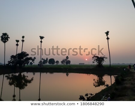 Foto stock: Beautiful Sunset Over Blue Sea