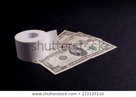 Foto stock: Therapeutic Self Adhesive Tape And Money