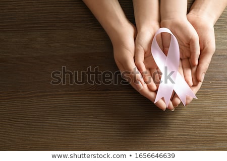 [[stock_photo]]: Prevent Text And Pink Breast Cancer Awareness Women Holding Card