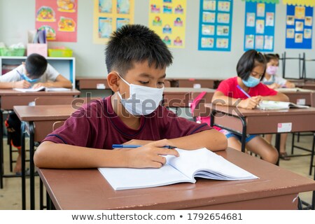 [[stock_photo]]: Schoolboy Studying In Classroom