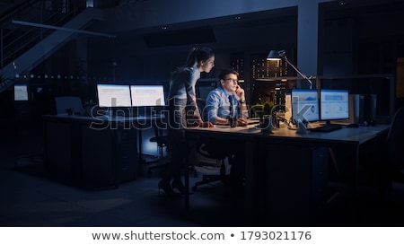 ストックフォト: Businesswoman Working At Computer In Night Office