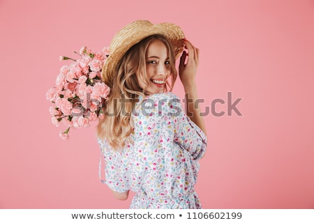 Foto d'archivio: Young Beautiful Woman With Pink Flowers