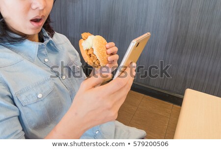 Stockfoto: Woman Looking For Something To Eat