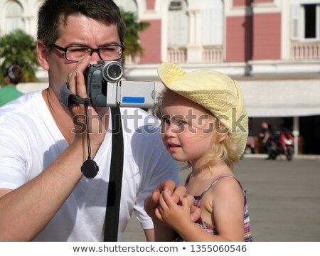 Stock photo: Man Looking At Videotape