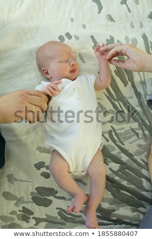 Stockfoto: Adorable Little Girl With Her Mommy And Daddy Portrait