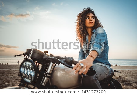 Stock foto: Biker Girl On A Motorcycle