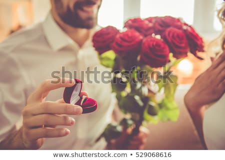 Stock foto: Man Proposing Marriage To A Surprised Woman