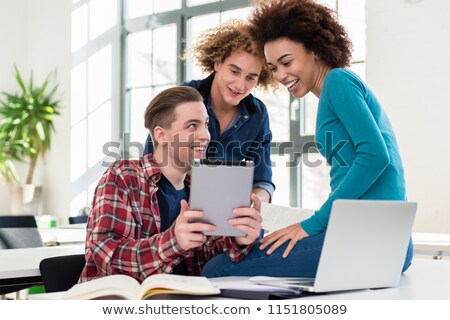 [[stock_photo]]: Three Involved Students Sharing Ideas And Opinions About Differe