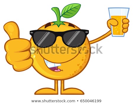 Foto d'archivio: Orange Fruit Cartoon Mascot Character With Sunglasses Holding Up A Glass Of Juice And Giving A Thumb