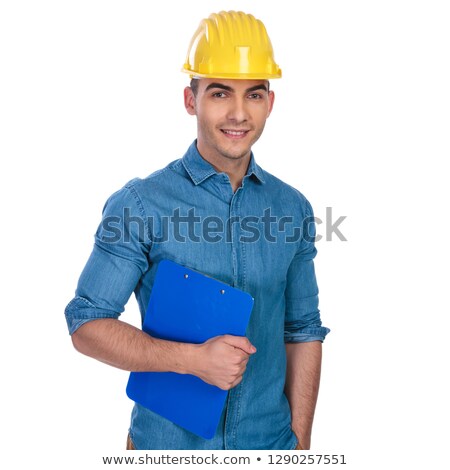 [[stock_photo]]: Portrait Of Relaxed Engineer Wearing Hard Cap And Holding Papers