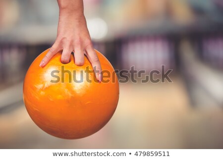 Stock photo: Hand Holding Bowling Ball