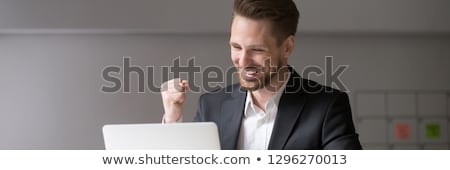 Stock foto: Happy Business Man Viewing Proposal Email On Laptop