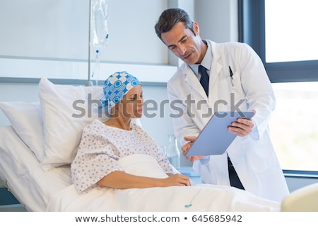 Foto stock: Doctor Telling Patient Her Results