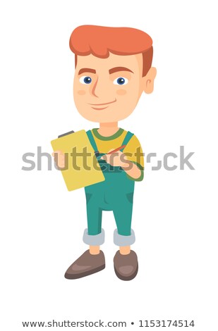 [[stock_photo]]: Boy Writing On The Paper Attached To A Clipboard