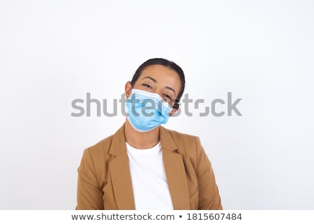 [[stock_photo]]: Attractive Caucasian Brunette Female Doctor Standing In Office With Crossed Arms