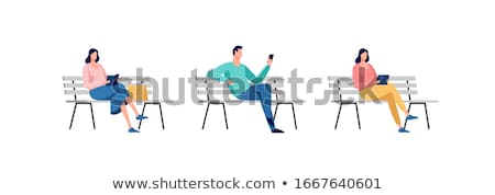 Stok fotoğraf: Businessman Sitting On A Bench In The Park