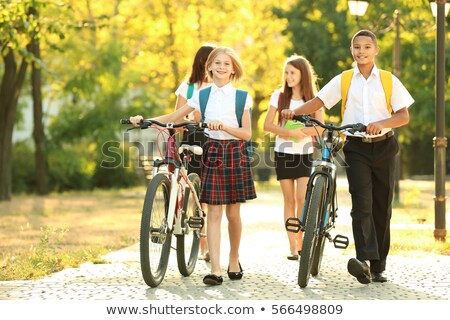 Stockfoto: Cheerful Young African Teenager With Bicycle Outdoors