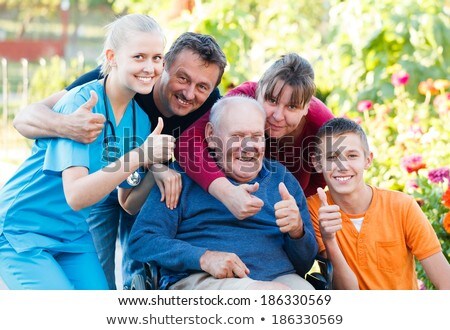 Elderly Lady Being Visited By Doctor Stock photo © Barabasa