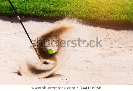 Foto d'archivio: Iocatore · di · golf · nel · bunker · di · sabbia