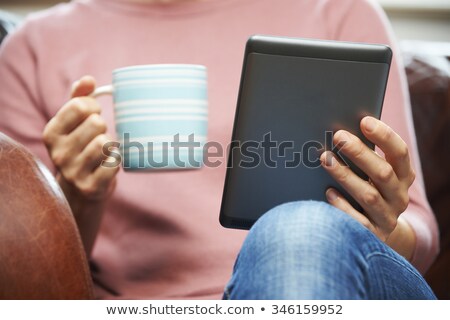 Foto stock: E Book Reader And Coffee