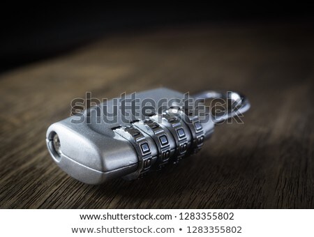 Zdjęcia stock: Number Digits Code Key Lock On Table Dim Light