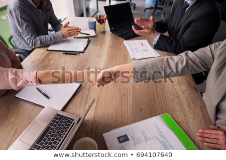 Stok fotoğraf: Holding Negotiations In Meeting Room