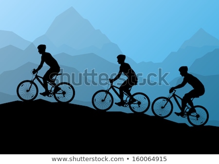 ストックフォト: Young Woman Training On Mountain Bike And Cycling In Park