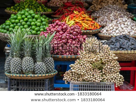 Foto stock: Chili Pepper And Lime For Sale At Asian Market Organic Food