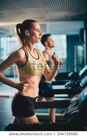 Sportive Girl Training In Gym Stockfoto © Pressmaster