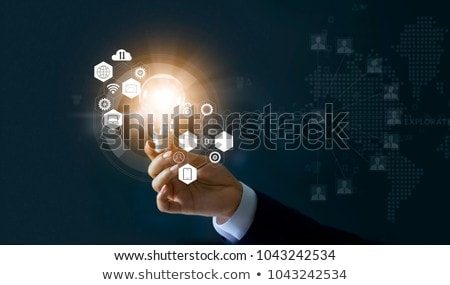 Foto stock: Businessman Holding A Lightbulb