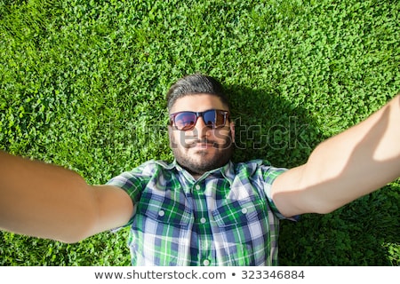 Stockfoto: Indian Man Taking Rest At Park