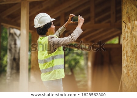 Photo Of Happy Woman Construction Engineer Wearing Protective Or Stockfoto © MilanMarkovic78