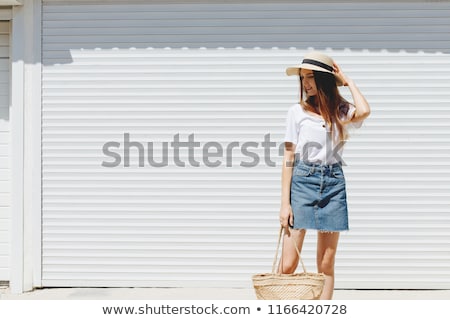 [[stock_photo]]: Model In Jeans Skirt