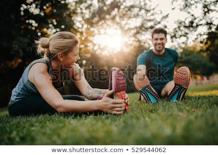 [[stock_photo]]: Stretch Exercises In Park