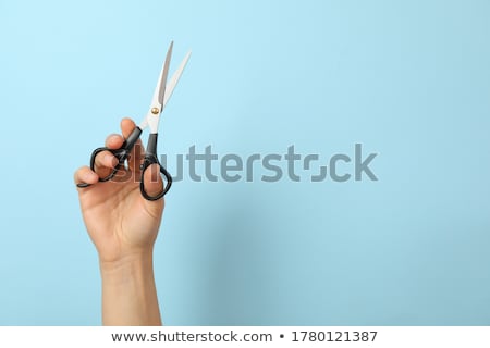 Stok fotoğraf: Female Hand Holding Scissors