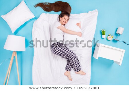 Stockfoto: Girl Hugging Pillow