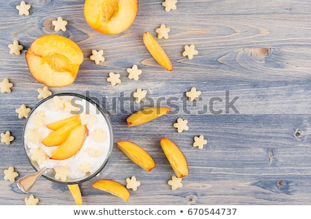 Stock photo: Colorful Healthy Breakfast With Corn Flakes Ripe Slice Peach On Blue Wood Board Decorative Border