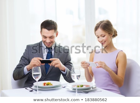 Zdjęcia stock: Romantic Dinner With Smartphone