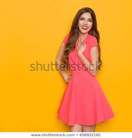 Stock foto: Portrait Of A Delighted Young Woman In Summer Dress