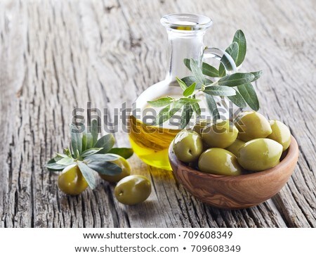 Green Olives On Wooden Background Stock foto © Dionisvera