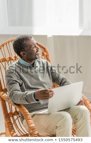 Stock photo: Senior Man With A Laptop In The Sunshine