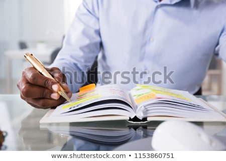 Stok fotoğraf: African American Man Writing Tasks And Events