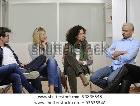 Multi Ethnic People Sitting In Circle Counseling Imagine de stoc © mangostock