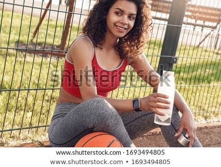 商業照片: Young Woman With Bottle Of Water