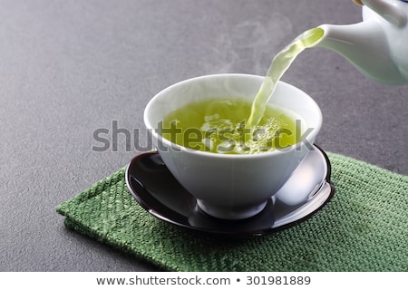 Foto stock: Japanese Teapot And Cup Of Green Tea