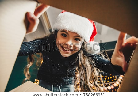 Stockfoto: Family Opening Presents At Christmas Time