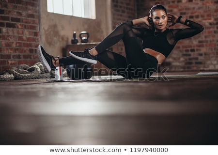 [[stock_photo]]: Fitness Woman Training Core With Bicycle Crunches Exercise